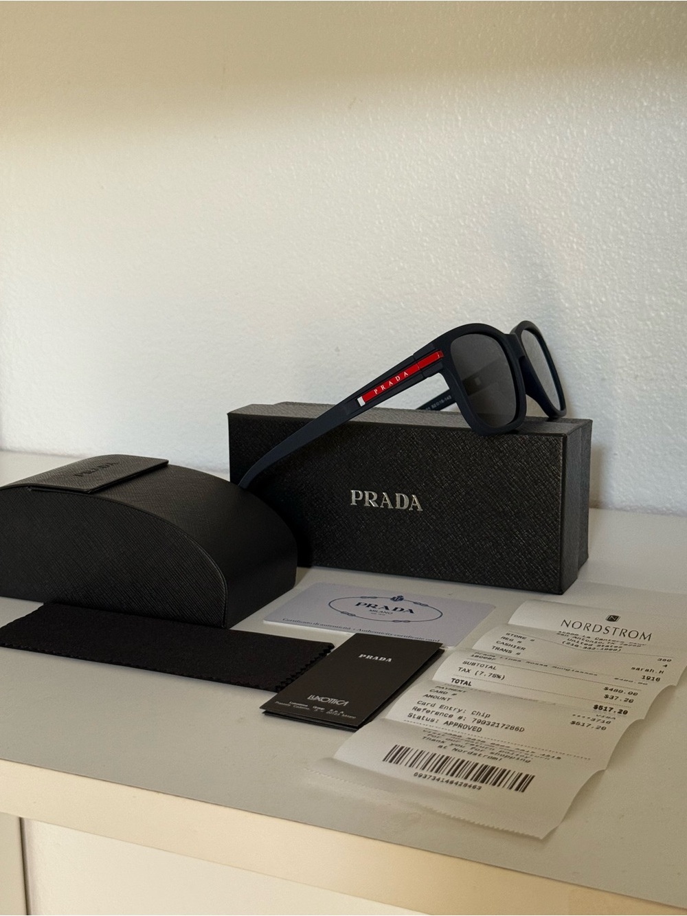 Prada Black Sunglasses with Red Accent